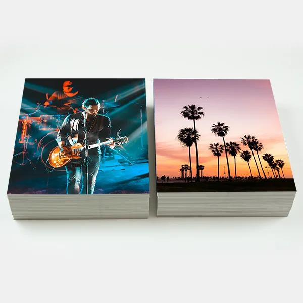Image of 2 stacks of 8x10 prints
